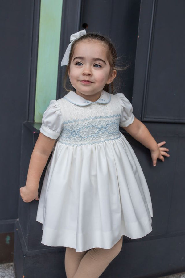 Naxos Ivory & Blue Hand Smocked Dress With Bow On The Back - 7622