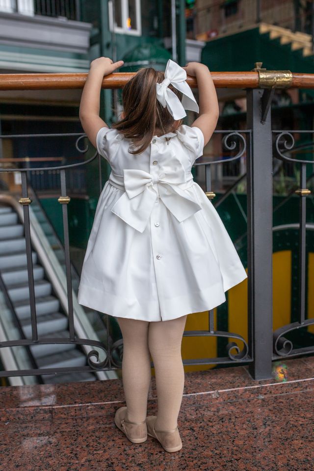 Naxos Ivory & Blue Hand Smocked Dress With Bow On The Back - 7622