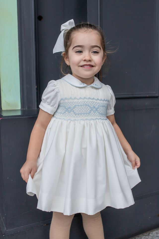 Naxos Ivory & Blue Hand Smocked Dress With Bow On The Back - 7622