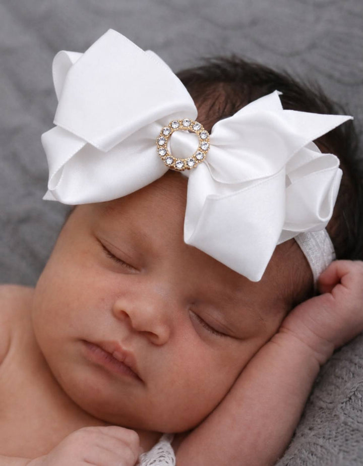 Bowtique London -   White Satin Bow Headband With Diamante