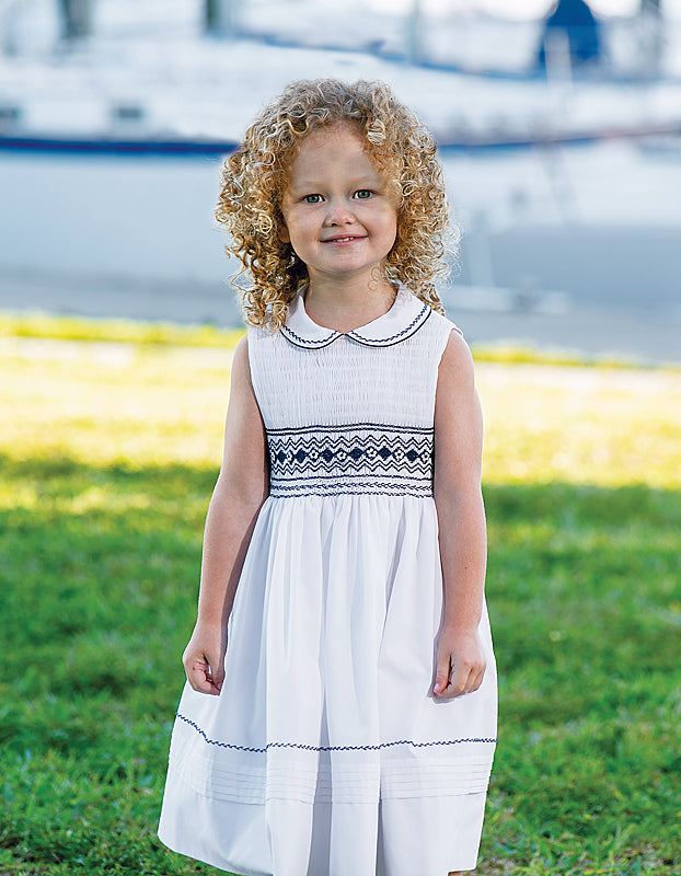 Sarah Louise Girls White And Navy Blue Hand-Smocked Dress